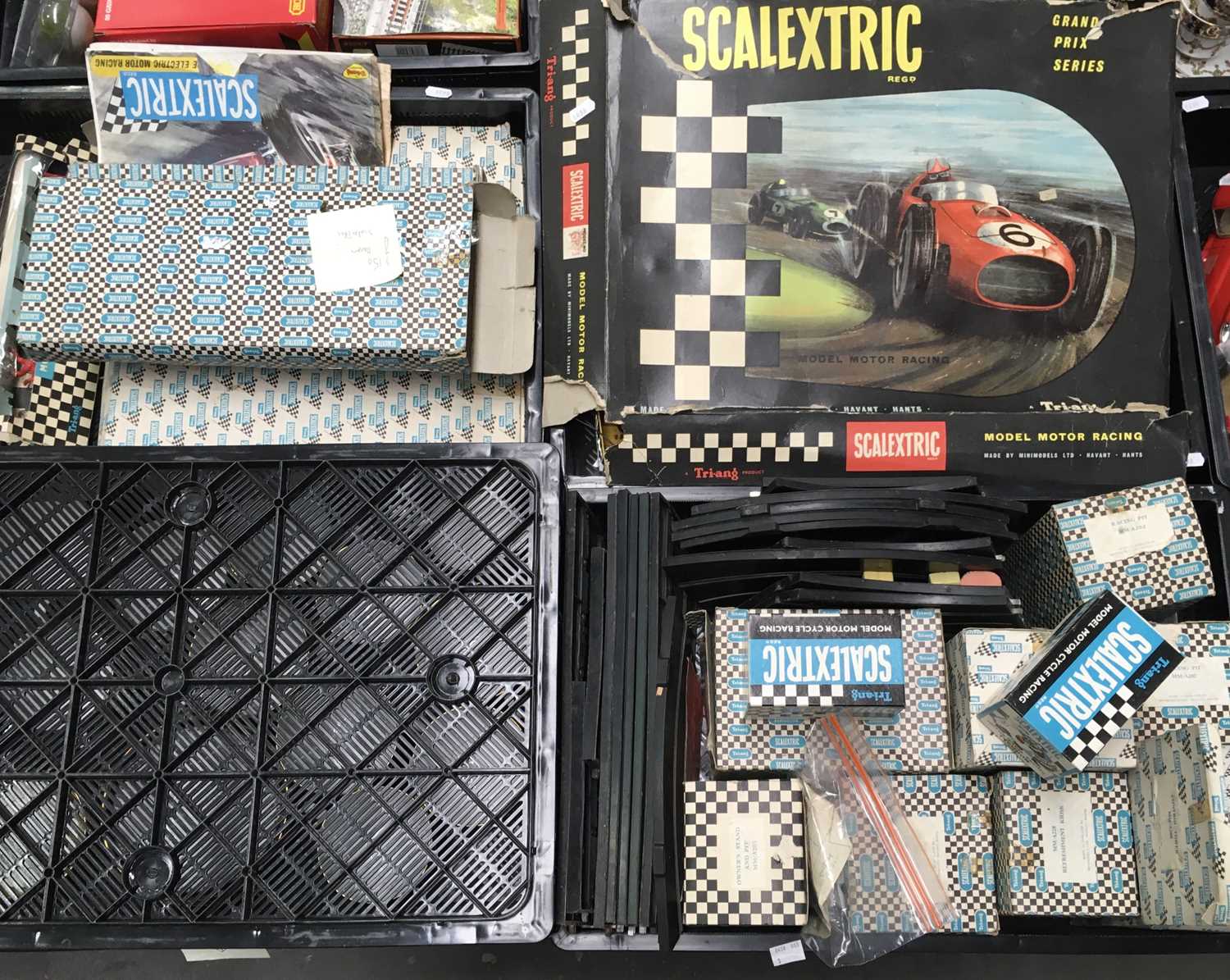 A large collection of Scalextric to include track, buildings, figures, motorbikes etc ( 3 trays )