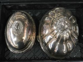 Two plated meat covers, lobed form with foliate cast handles, (2)