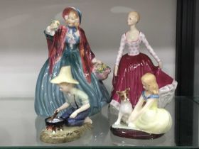 Four Royal Doulton figures, Lady Charmain, HN1948, 20cm high, Fiona HN2694, River Boy HN2128 and