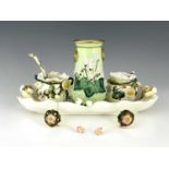 George Jones, a relief moulded and pianted strawberry set, including tray, bowl and jug, with