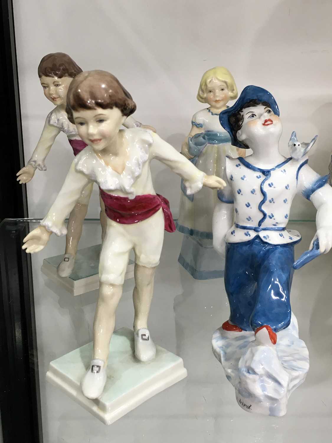 Four Royal Worcester figures, including Early Bird by Pinder Davis, circa 1954, 6cm high; F G