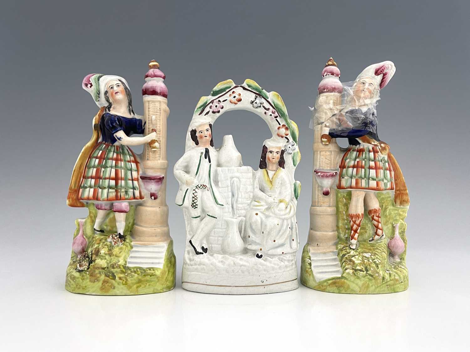 Staffordshire temperance figures collecting water from a fountain, circa 1860, figures modelled as a - Bild 2 aus 6