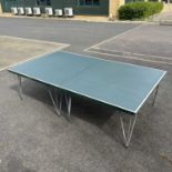 A Dunlop full size table tennis table on folding supports W: 276 cm D: 153 cm H: 76 cm