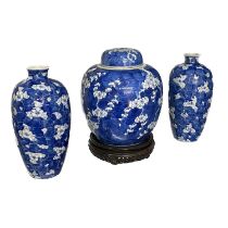 A large Chinese blue and white ginger jar and cover, decorated with flowering prunus branches,