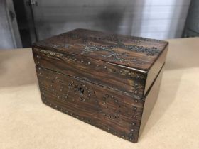 A rosewood stud work box