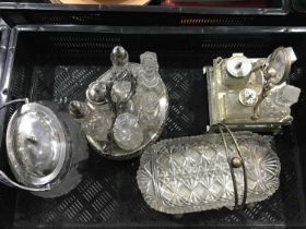 Two Victorian silver plated and cut glass cruet sets, with original bottles, together with cut glass