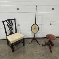 A mahogany pole screen, with an oval silk panel featuring flowers W: 45 cm H: 141 cm, together