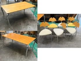 Two designer tables and six matching 'Dolphin' style chairs, each with metal legs (8)