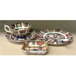 A Royal Crown Derby Imari pattern trio, 1128, an Imari pattern solid gold band pin dish, 1128, and a