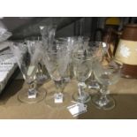 A collection of 19th engraved and etched drinking glasses