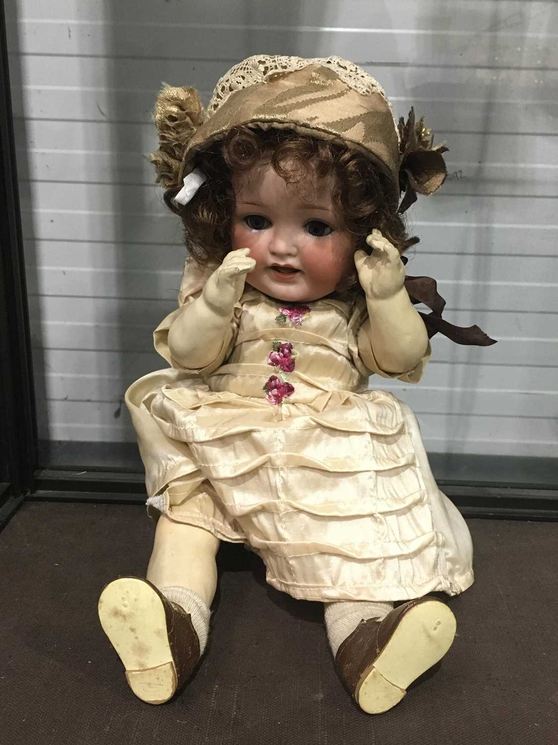 Heubach Koppelsdorf bisque head doll model number 342, with blinking eyes, open mouth with exposed