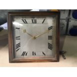 H. Pidduck & Sons, Hanley, an Art Deco square easel desk timepiece, silvered dial with Roman