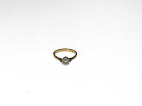 An 18ct gold diamond single-stone ring