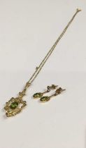 A 9ct peridot and seed pearl pendant suspended on an 18k figaro fine link chain, together with a