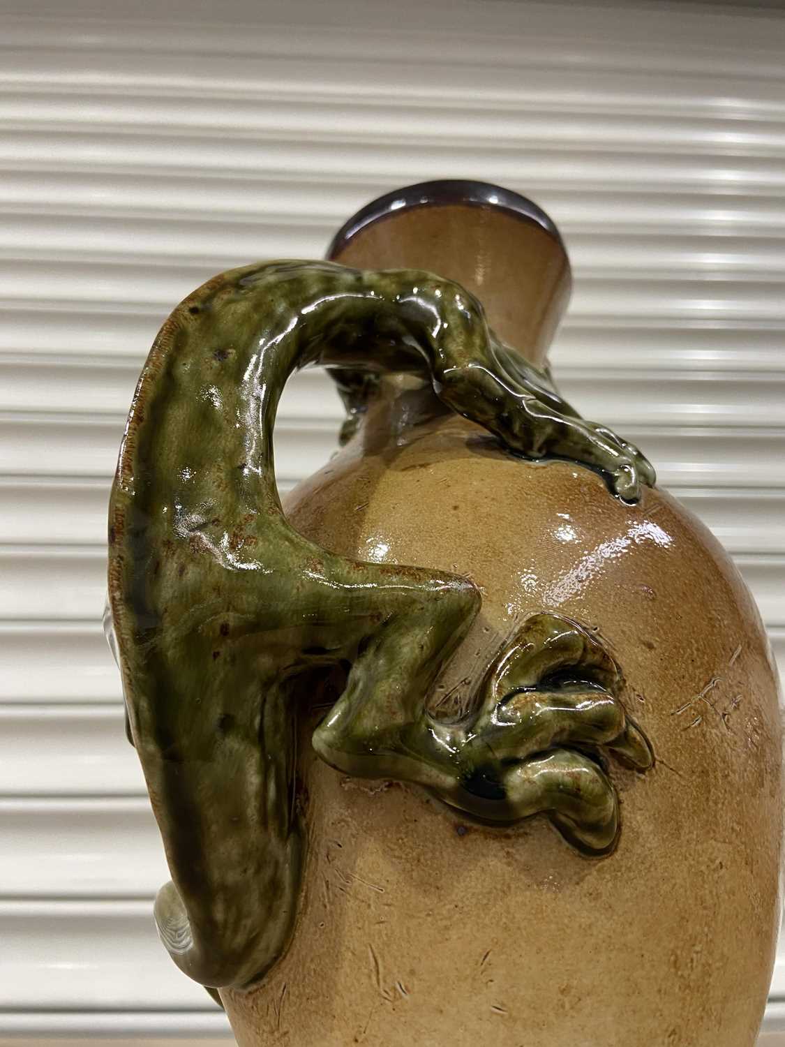 Large stoneware jug with applied, stylised three-dimensional green dragon snaked around the - Image 2 of 3