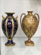 A Royal Crown Derby twin handled pedestal vase, ovoid form, heavily gilded decoration depicting