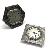 Two Art Deco desk clocks, one with faux boulle decoration, octagonal form with silvered dial, the
