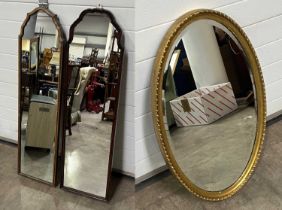 Two converted cheval mirrors 33 x 128 cm, and 36 x 130 cm, together with a oval, gilt, bevelled edge