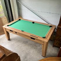 A Three in one Multi-Games and dining table, pool, table tennis and air hockey