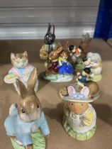 Various Royal Doulton Beatrix Potter and Royal Albert figures, including Santa Bunnykins, Billie and