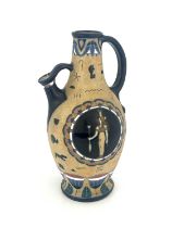 An Amphora Secessionist ewer, decorated with Egyptian and shaman type motifs, printed marks, 36cm