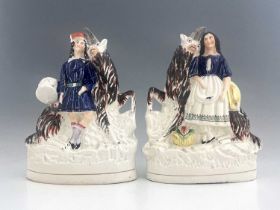 A pair of Staffordshire figures of royal children with goats, circa 1850, figures likely modelled as