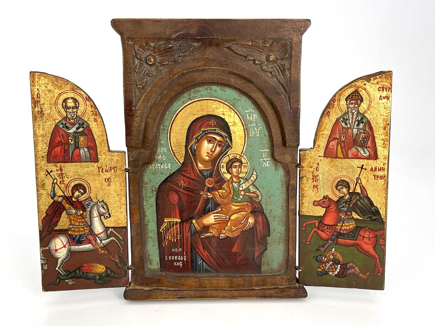 A Greek Orthodox triptych ikon, wooden frame with leaf-carved spandrels to the pediment, hinged - Image 3 of 6