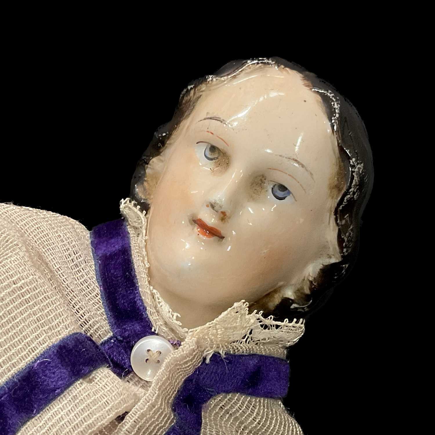 A 19th century German style china head doll, kid and cloth body, velvet trimmed linen dress and - Image 2 of 2