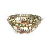 A Chinese Canton Famille rose bowl, Qing Dynasty, 19th Century, decorated with panels of narrative
