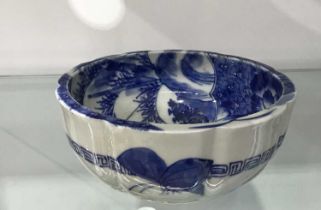 A Japanese bowl and white bowl, circa late 19th century, ogee rim, footed form, interior painted