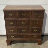 A Georgian design chest of ten drawers, nine square over one long W: 71 cm D: 31 H: 76 cm