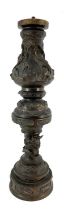 A Chinese bronze table lamp base in two sections, late Qing Dynasty, of baluster form, cast in