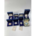 Eight Halcyon Days enamelled trinket/patch boxes, including a Limited Edition box, commemorating the