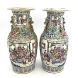 A pair of Chinese famille rose vases, Canton 19th century, shouldered form with lizard moulded necks