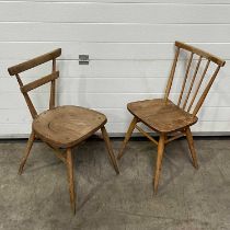 An Ercol blond elm stickback kitchen chair, together with a tapered back example, 80cm high (2)