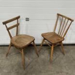 An Ercol blond elm stickback kitchen chair, together with a tapered back example, 80cm high (2)