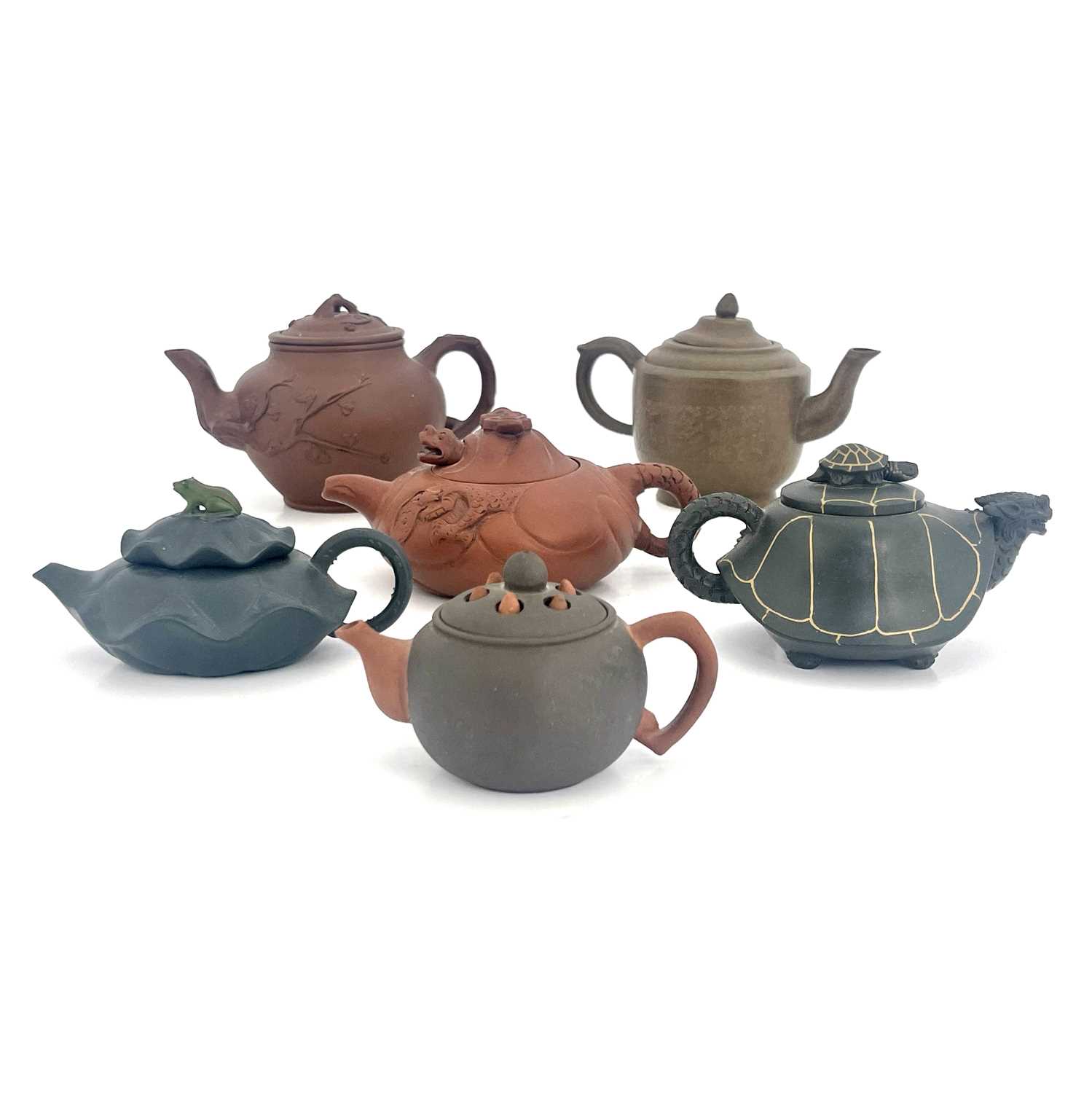 Six Oriental earthenware teapots, relief moulded figural and zoomorphic designs in terracotta and - Image 2 of 5