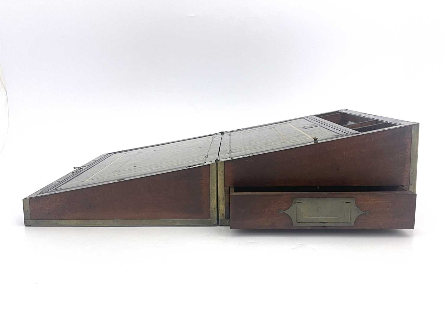 A George III flame mahogany campaign writing slope, circa 1820, brass-bound with a triple strung - Image 3 of 8