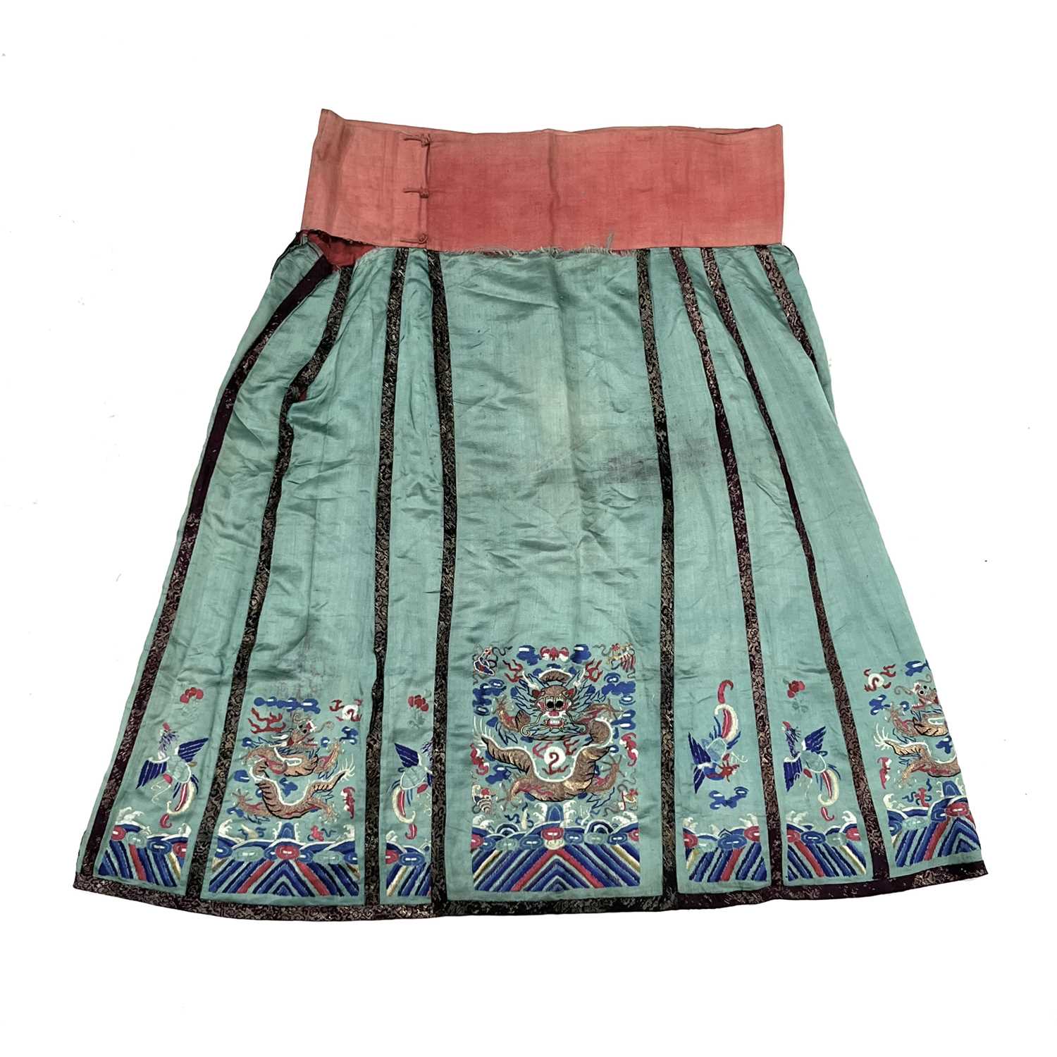 A Chinese silk embroidered skirt and overcoat, Qing Dynasty, 19th Century, the overcoat in red - Image 3 of 5