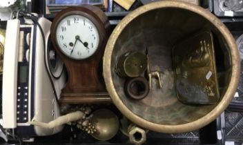 A collection of brass ware including Arts and Crafts style jardiniere, various bells etc, together