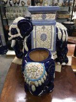 A large Chinese Pottery jardiniere stand in the form of an elephant, 43cm high, together with an