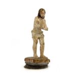 A 17th century carved wood and gesso figure of Jesus Christ, Man of Sorrows, Southern European,