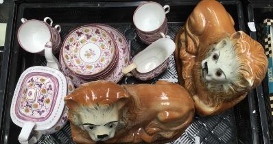 English porcelain lustre tea service, circa 1800, together with 2 glazed pottery lions with glass