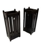 Liberty and Co., two Arts and Crafts oak umbrella stands, square section, slatted and pierced with