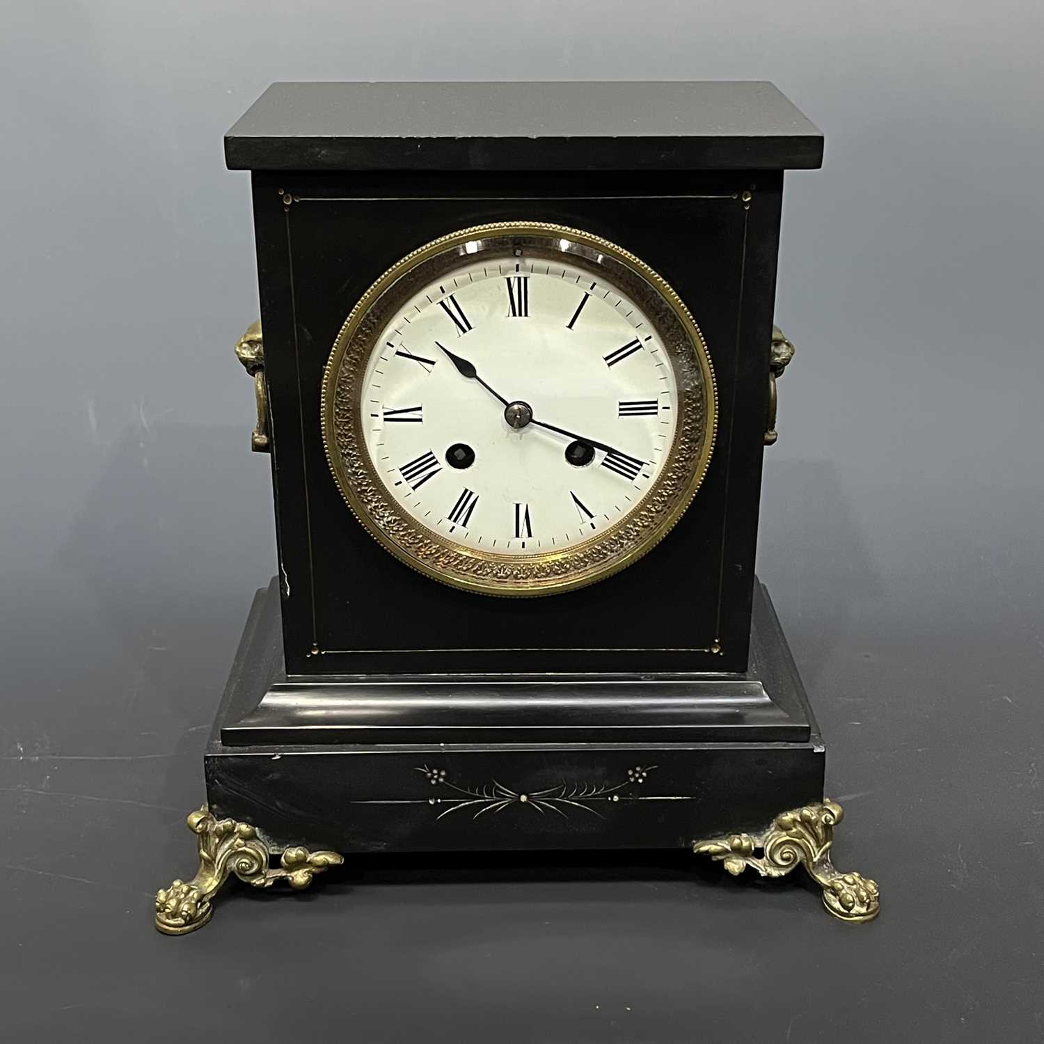 A 19th century black slate mantle clock.