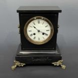 A 19th century black slate mantle clock.