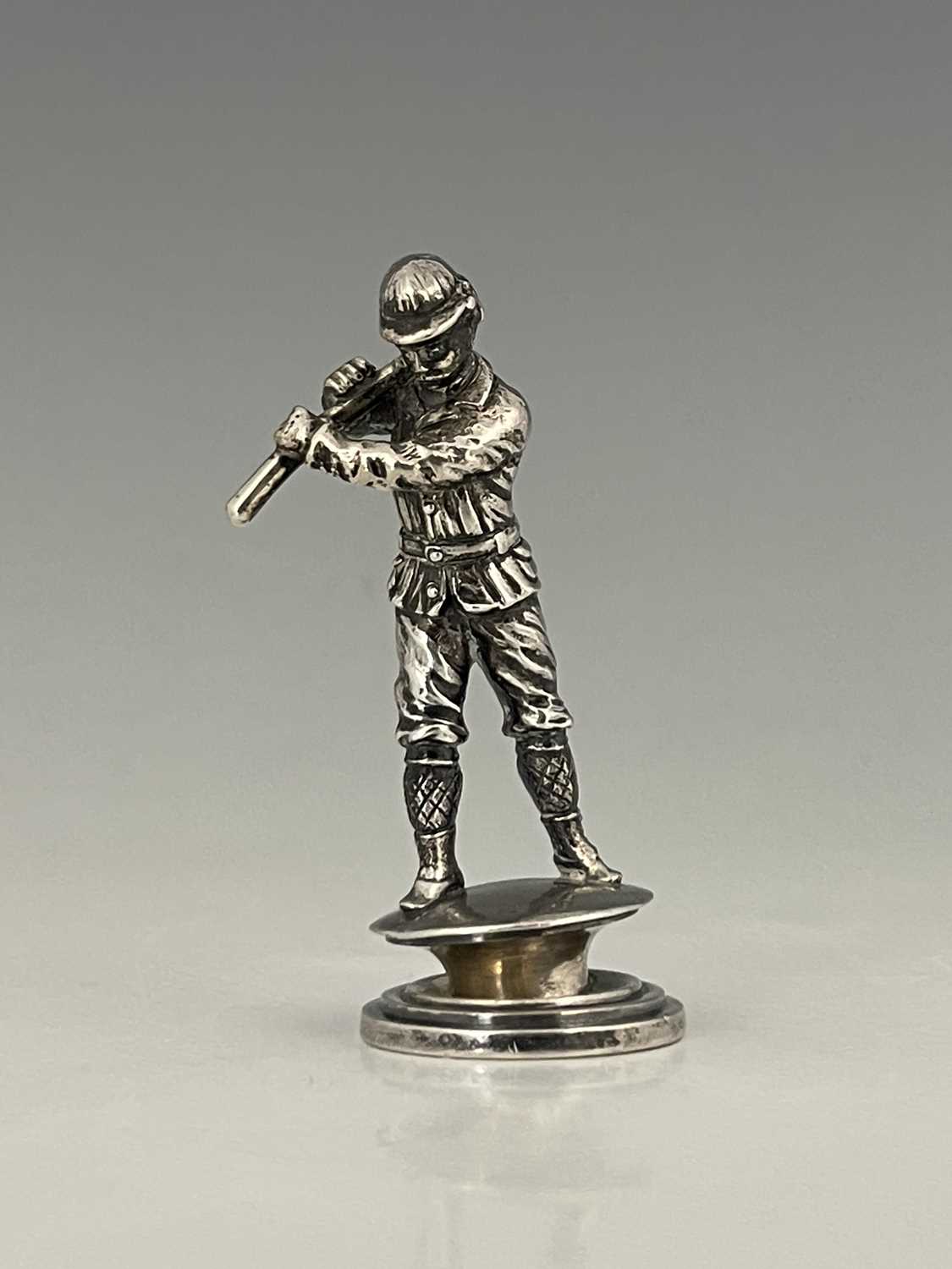A Victorian silver figure, cast and modelled as a figure in hunting dress, possibly continental in