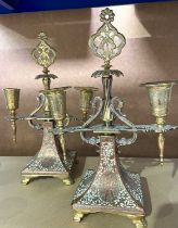 A pair of Mappin & Webb copper and brass two-branch candelabra, Middle Eastern design, struck marks,