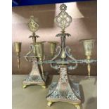 A pair of Mappin & Webb copper and brass two-branch candelabra, Middle Eastern design, struck marks,