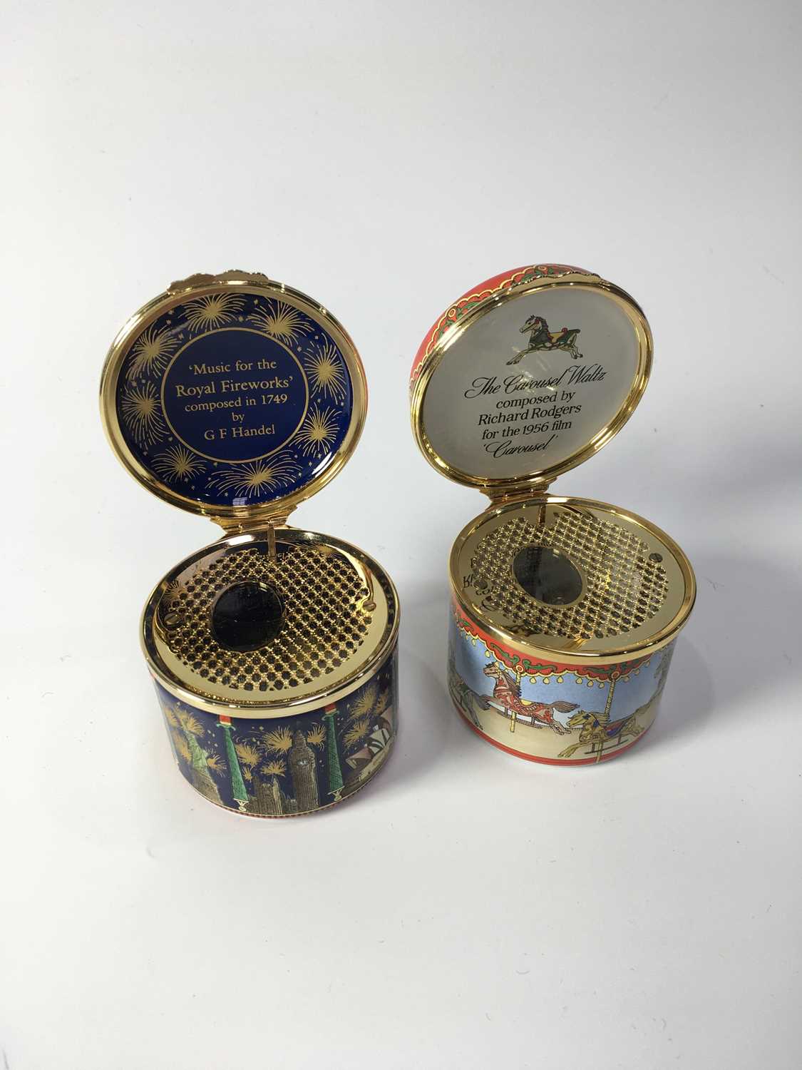 Two Halcyon Days enamelled musical boxes cylindrical form, including a Limited Edition box decorated